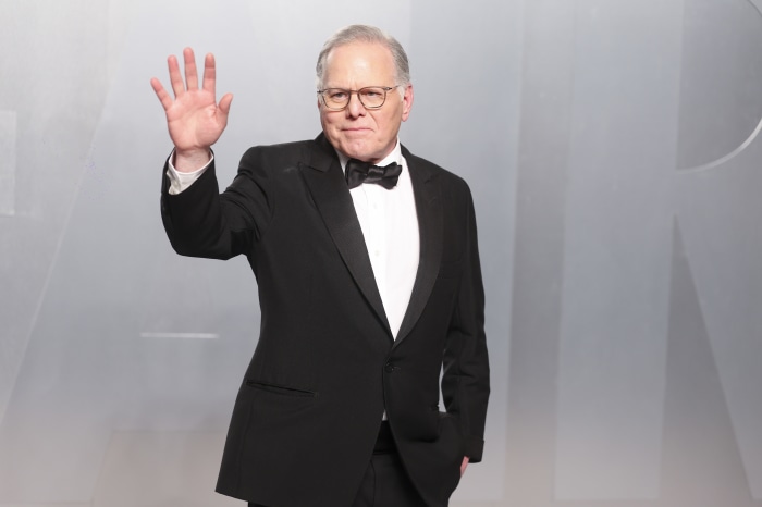 David Zaslav waving to the camera at the 2026 Vanity Fair Oscar Party.