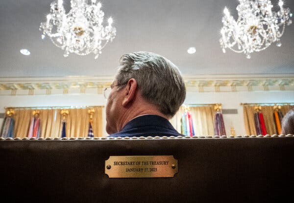 Scott Bessent, seen from behind, as he attends a Cabinet Meeting in the White House.